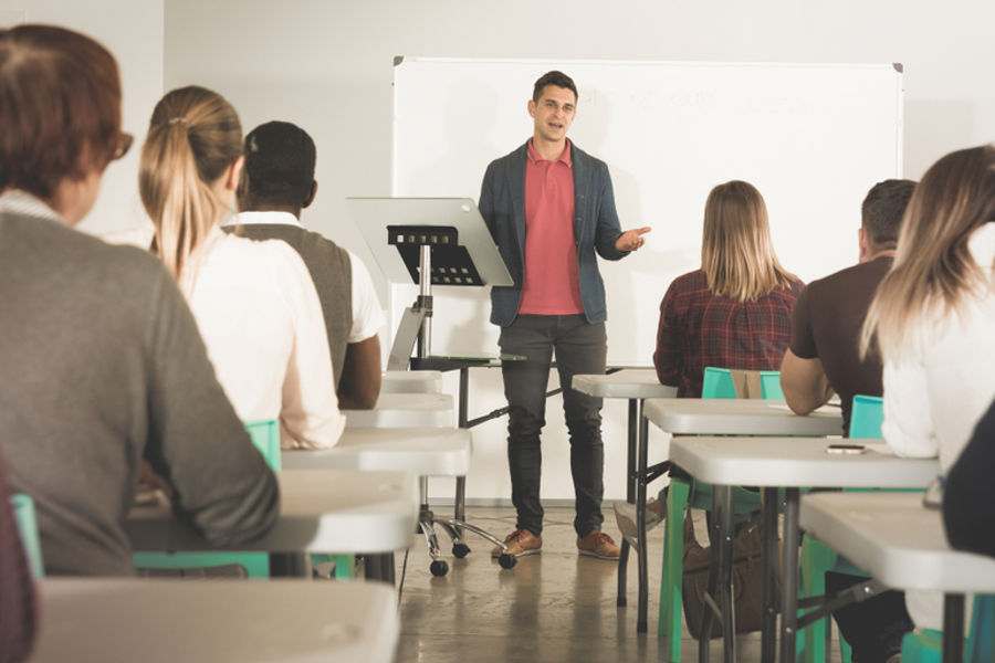 teaching a seminar to potential customers