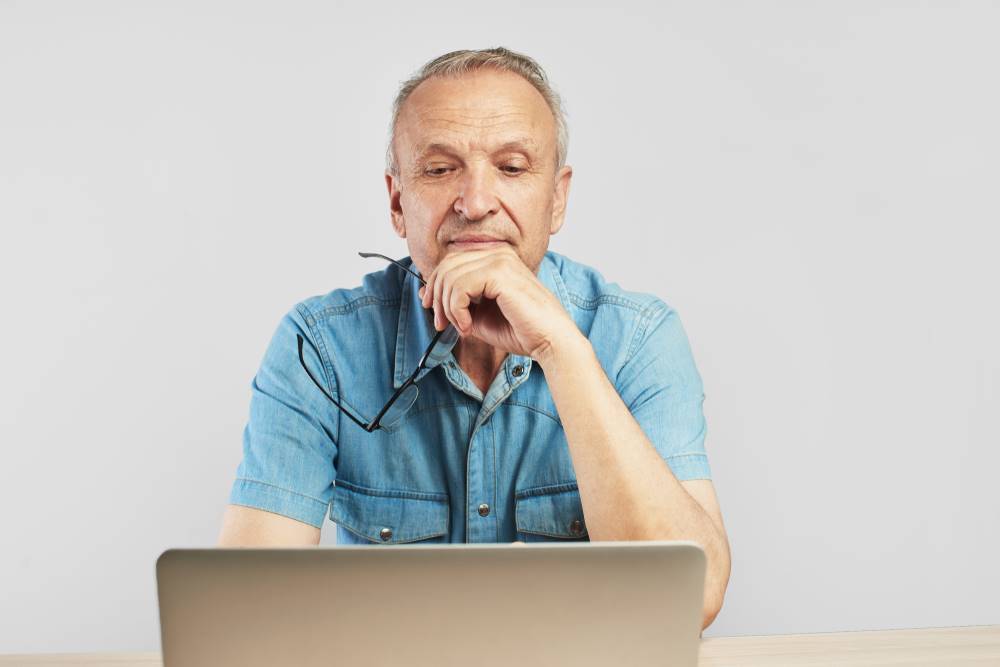 business owner thinking about what to write on website