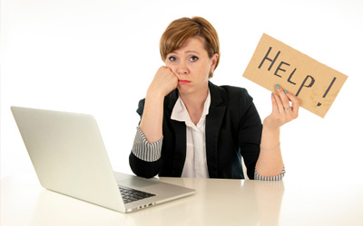 office admin holding a help sign